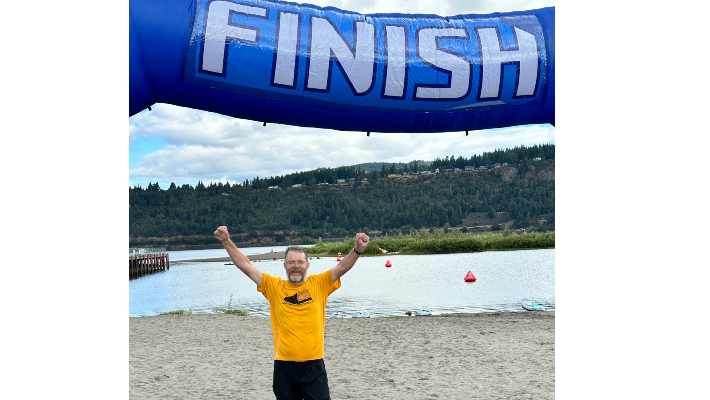 Tim Cook finish line CCC President Tim Cook raises his arms in celebration at the ROCCS finish line